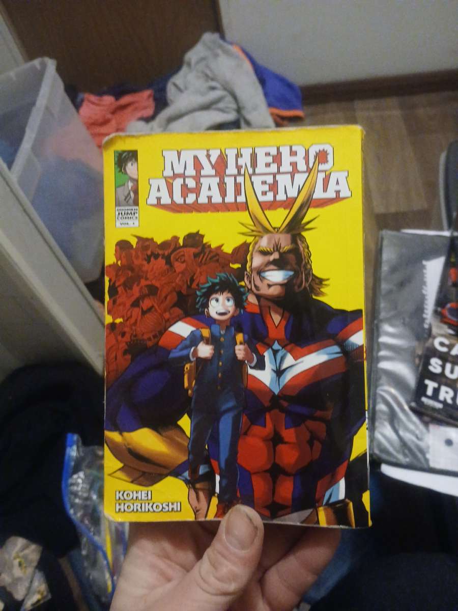a box set of expensive books and 3 anime books for cheap