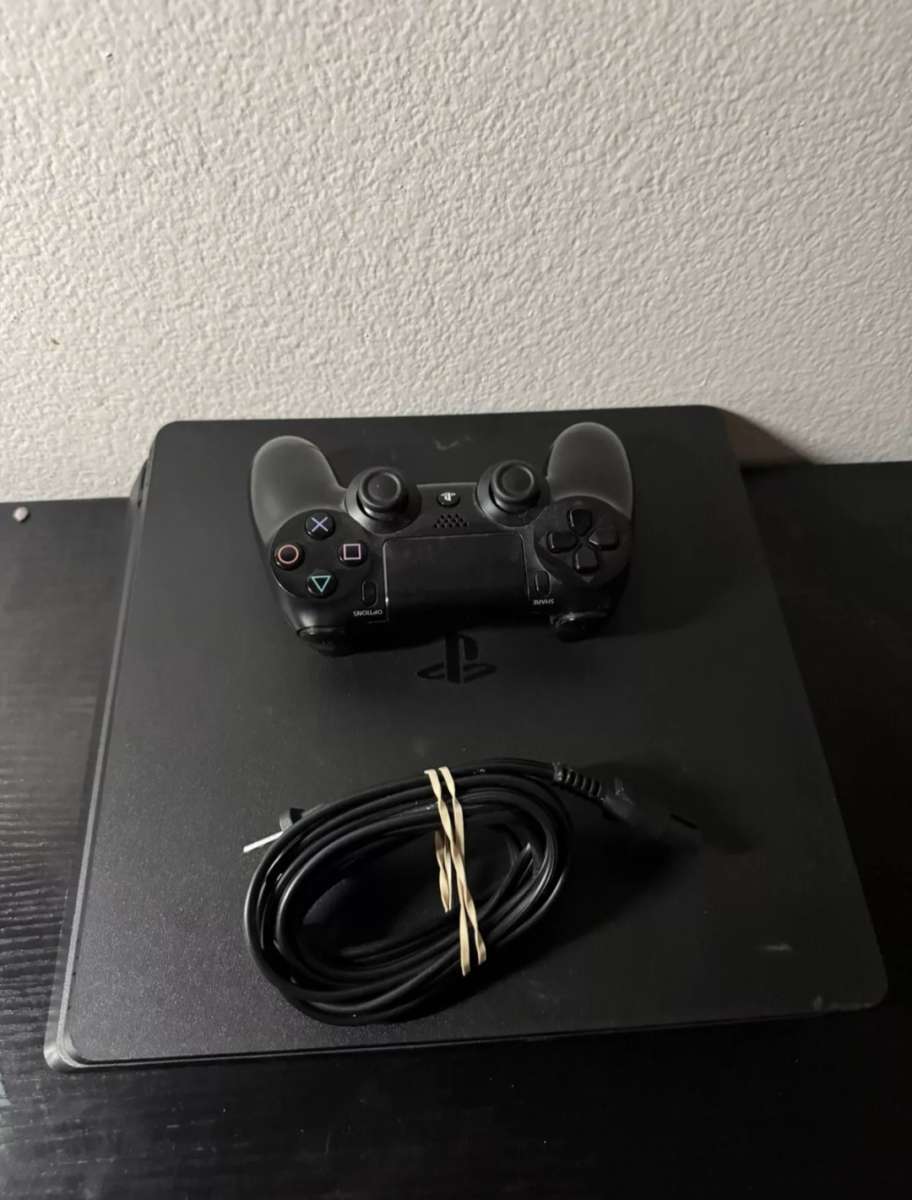 PlayStation 4 Slim 1TB With Wireless controller