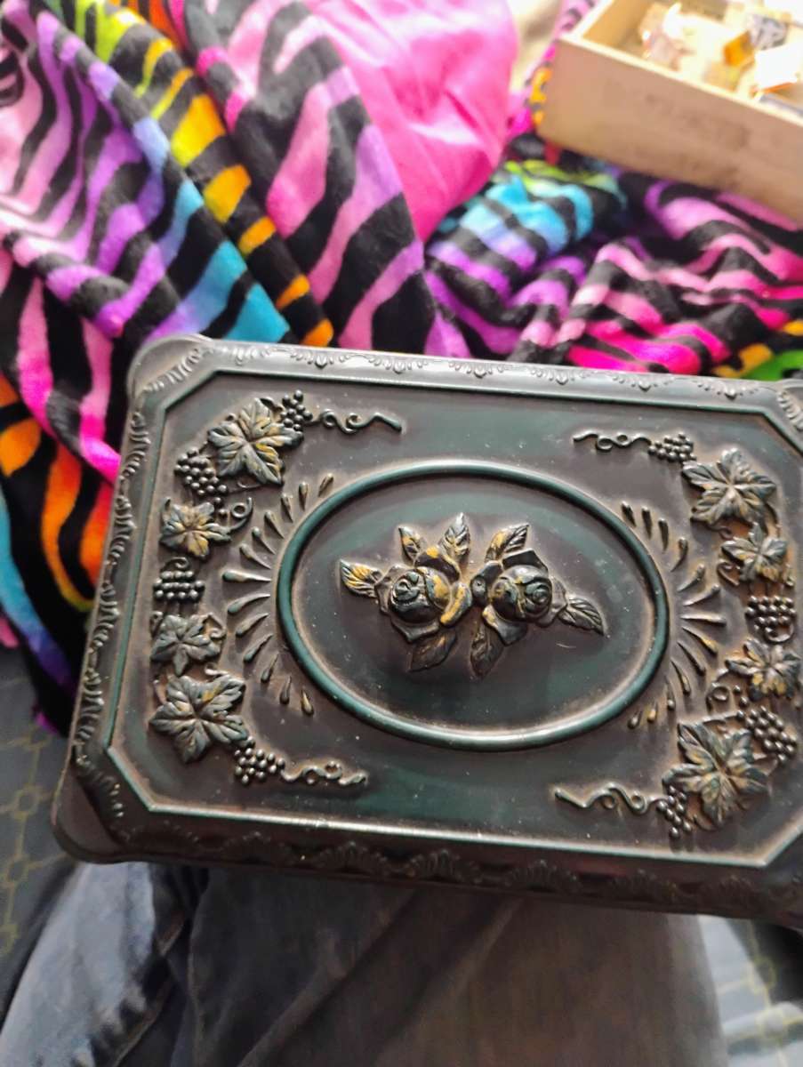 collection pins and vintage jewelry box