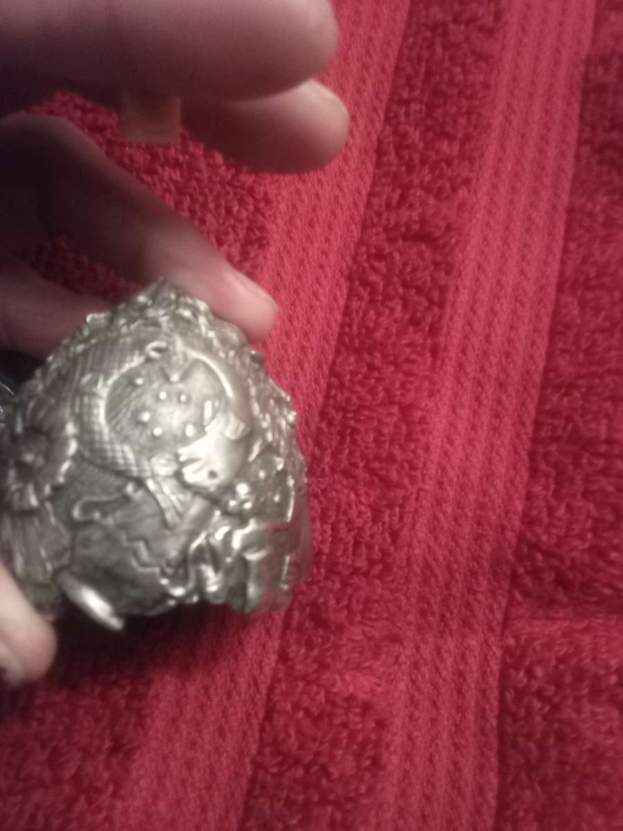 antique silver egg with horoscope signs
