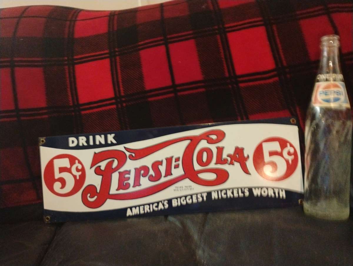 Vintage metal Pepsi sign and 16oz bottle