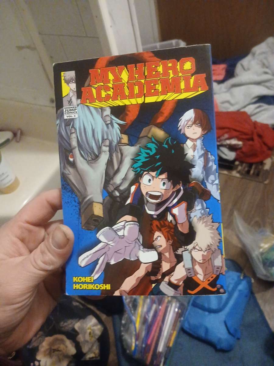 a box set of expensive books and 3 anime books for cheap