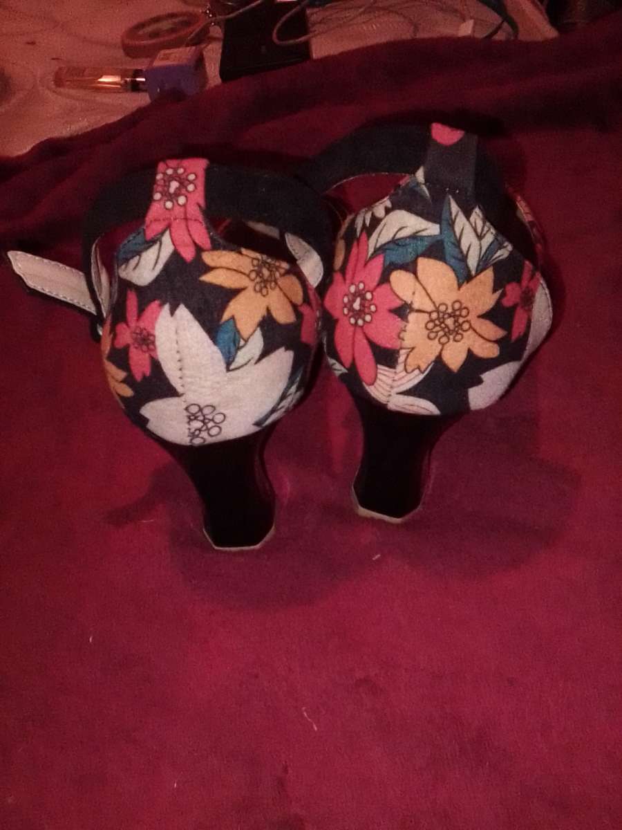 floral hells never worn