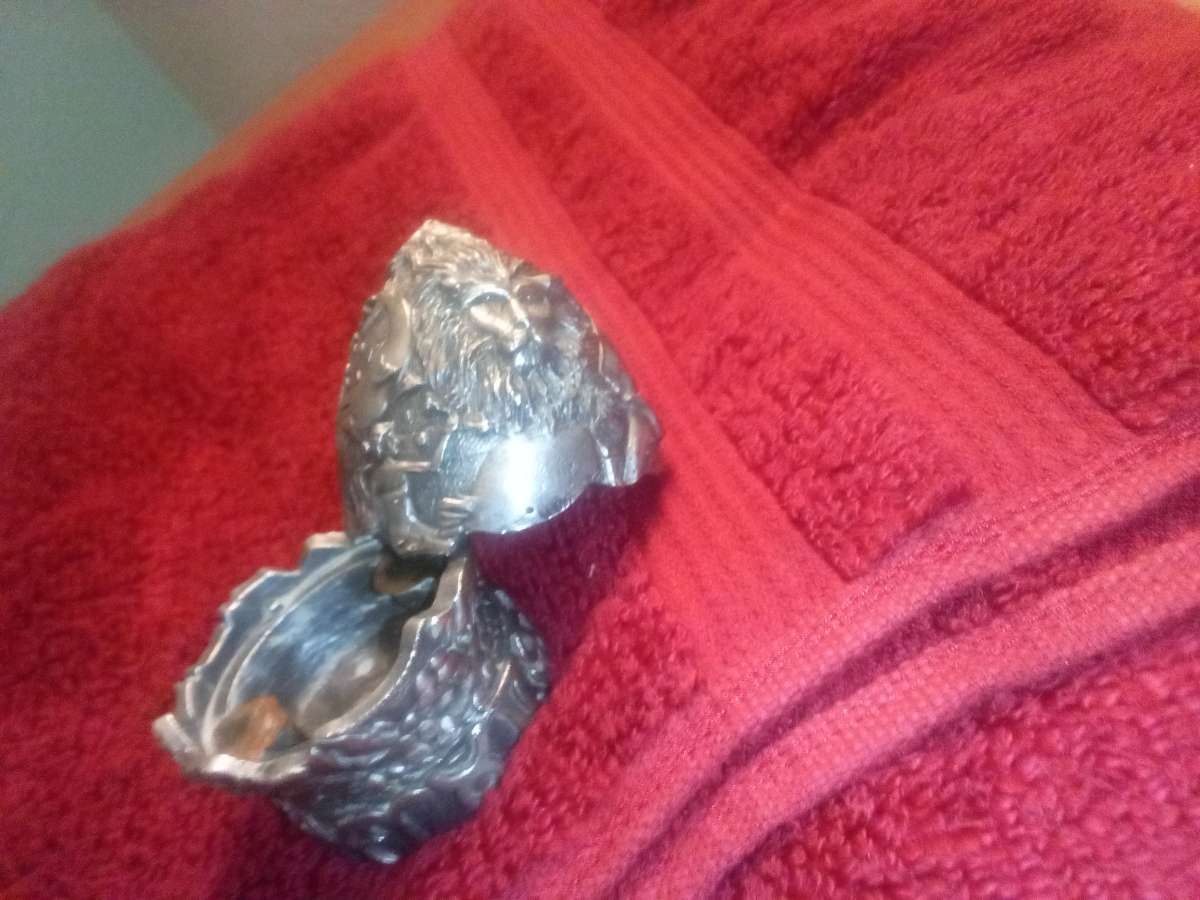 antique silver egg with horoscope signs