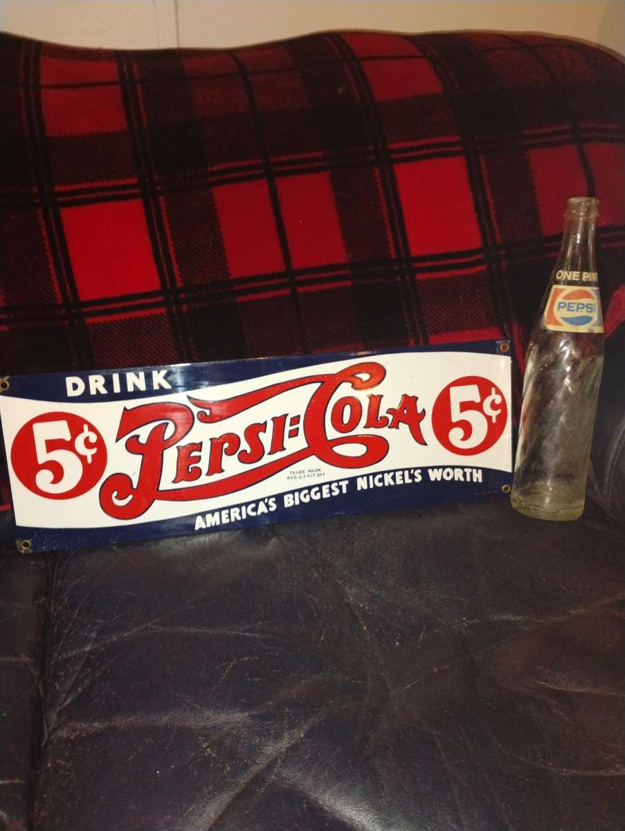 Vintage metal Pepsi sign and 16oz bottle