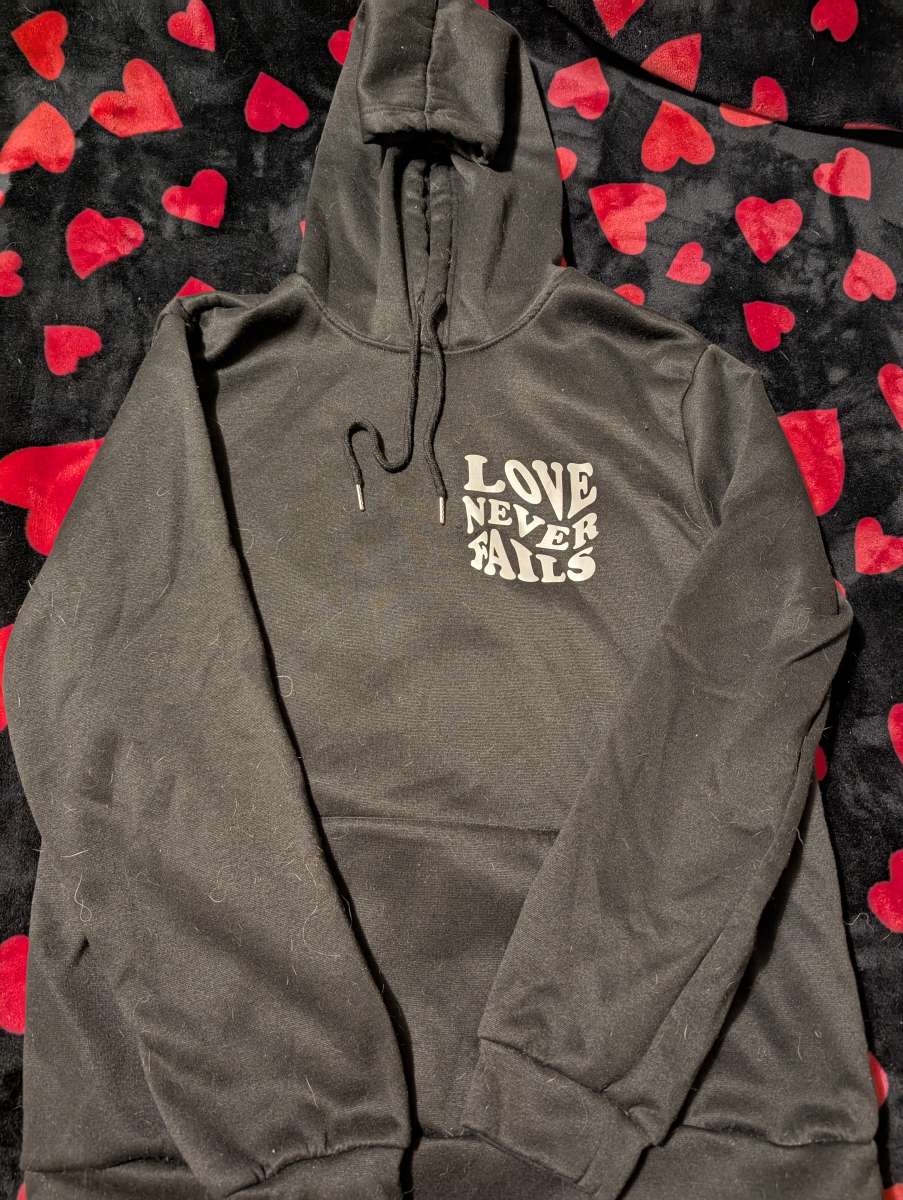 Love Never Fails Hoodie