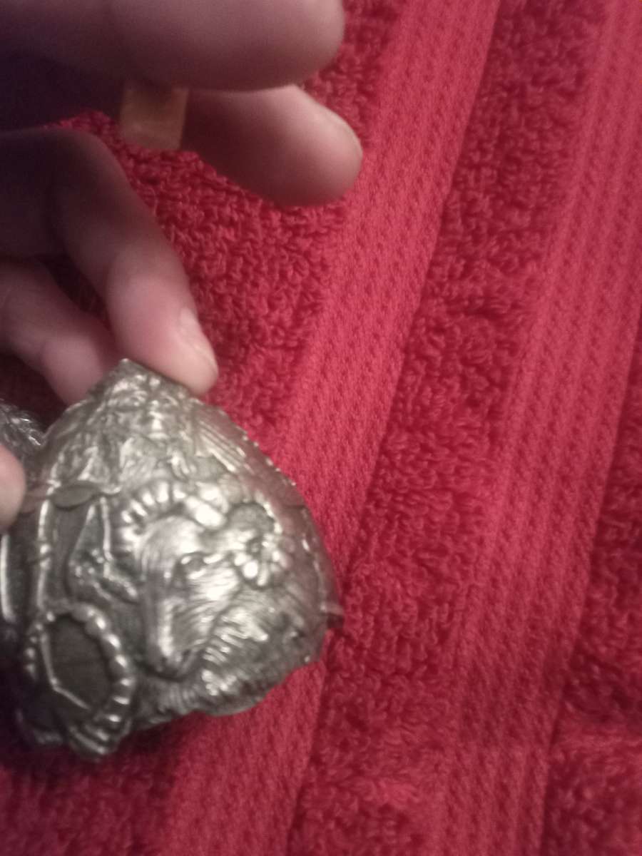 antique silver egg with horoscope signs