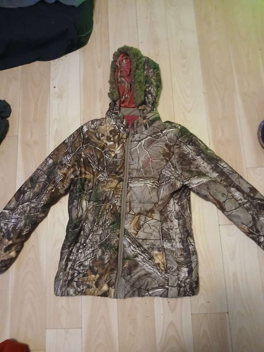 a pair of women boots size 6 and a womens medium jacket tree