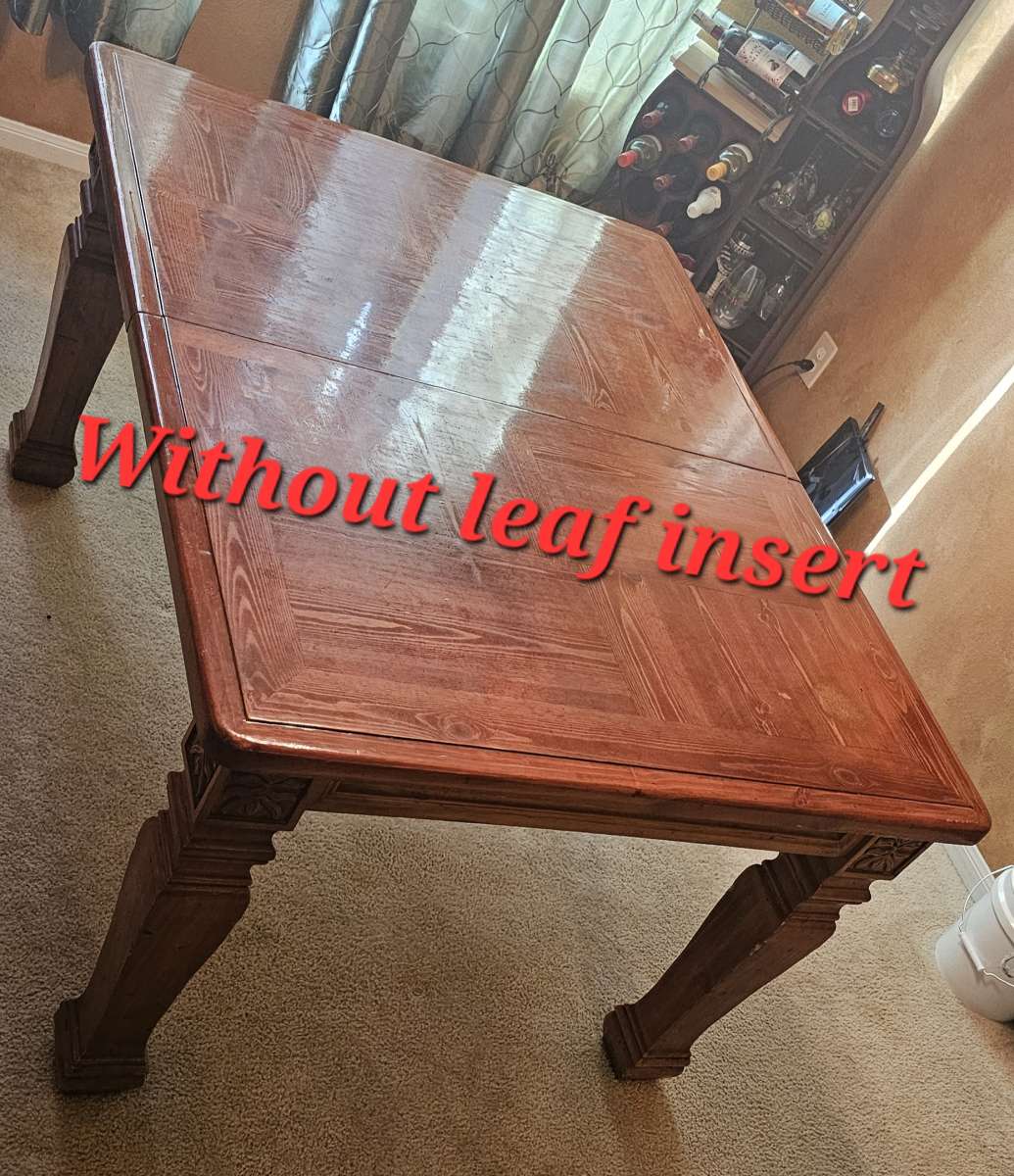 Solid wood dining table with insert