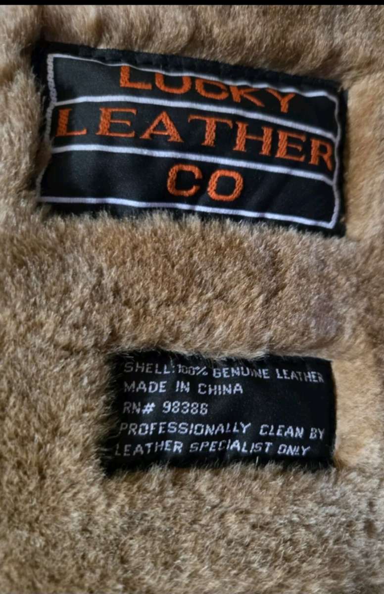 Large Lucky Lether Co Coat Tan like new o lyrics worn once