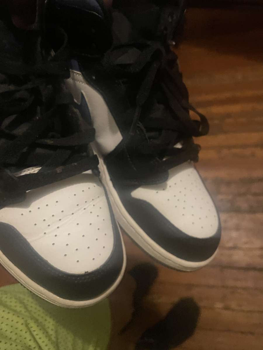 blue black and white nike shoes