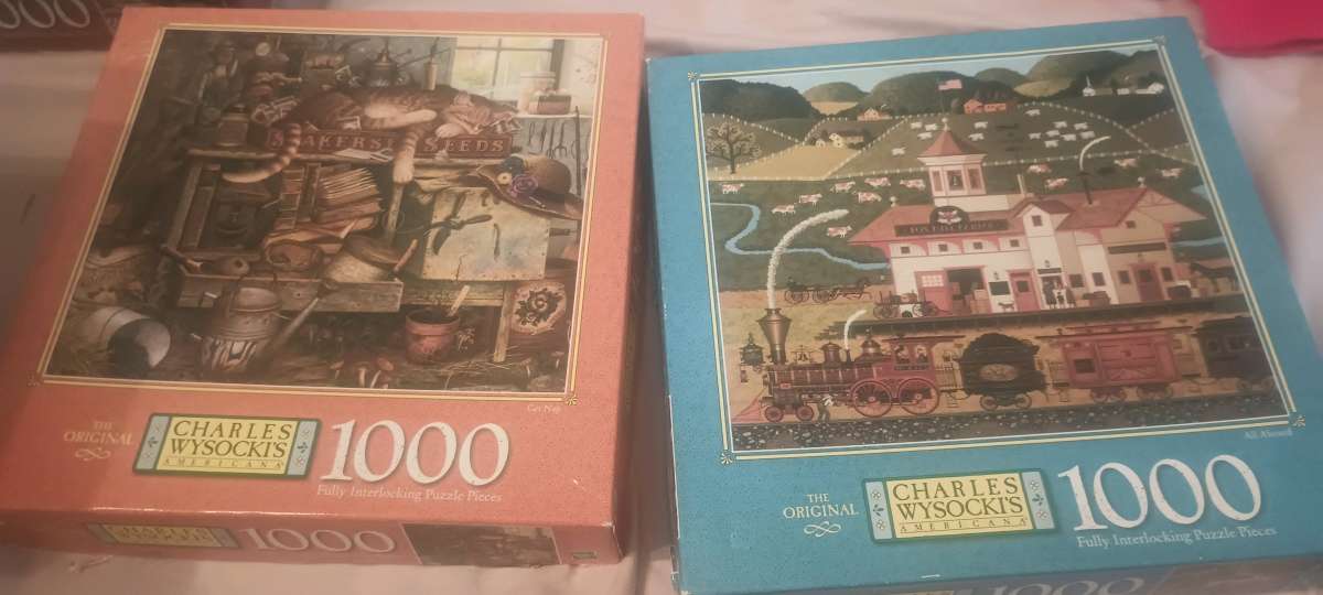 charles wysocki puzzles I have 20 of them all the pieces