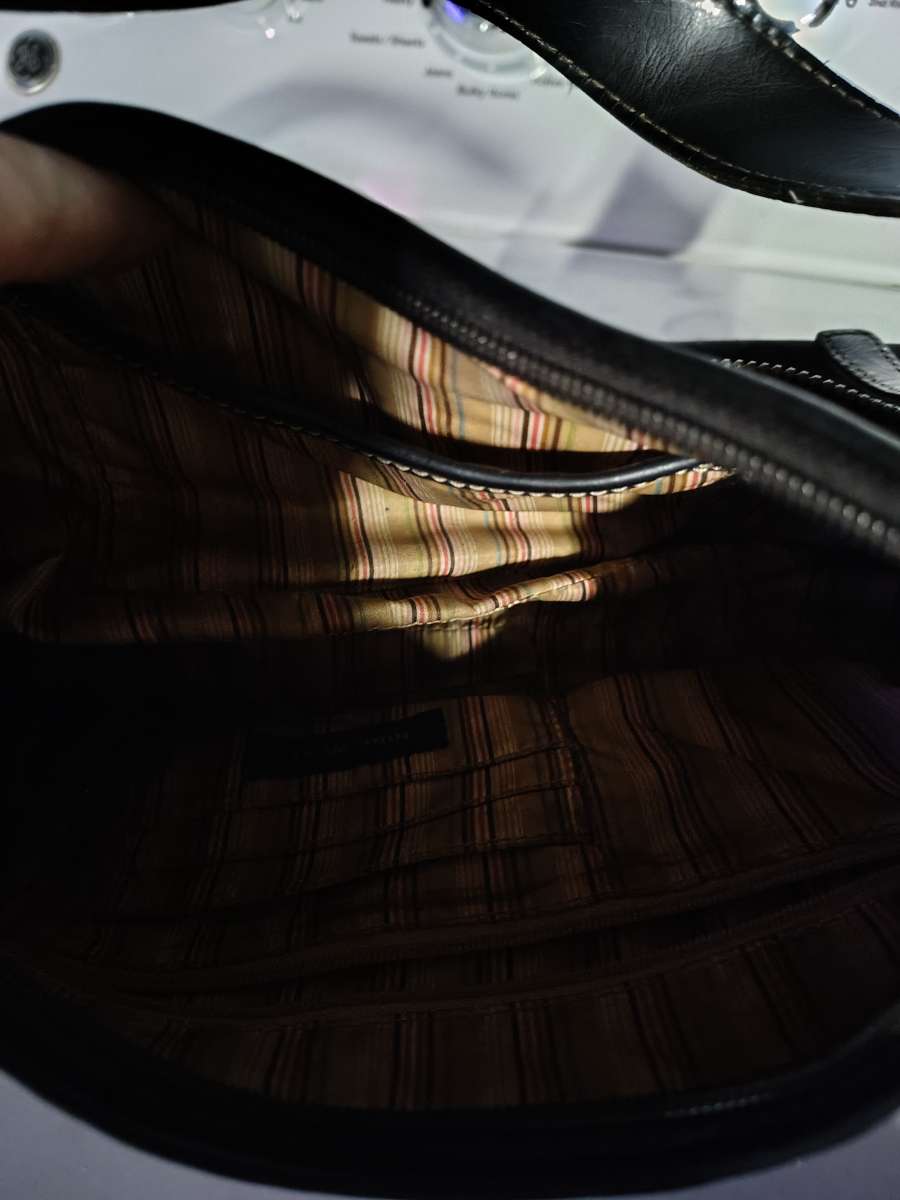 a black small purse Mine West