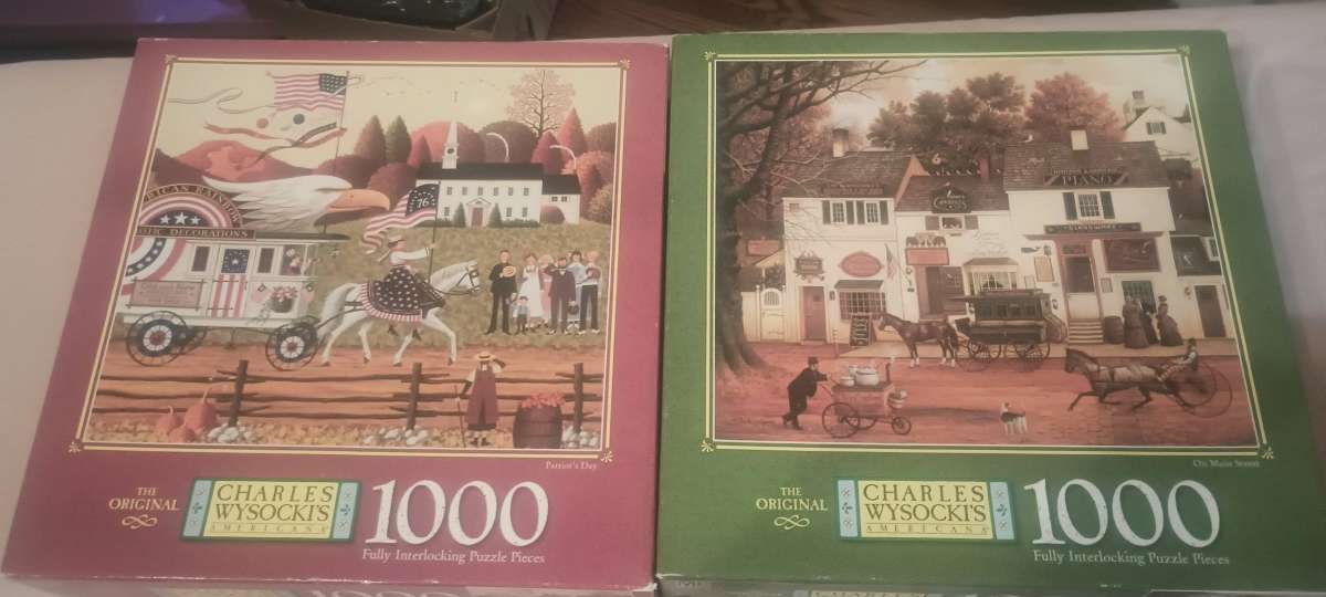 charles wysocki puzzles I have 20 of them all the pieces