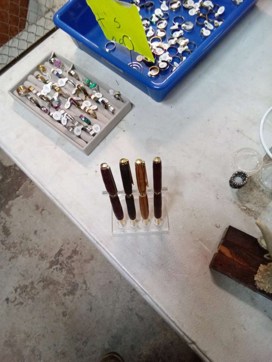 hand crafted pens and pencils of different  exotic  woods