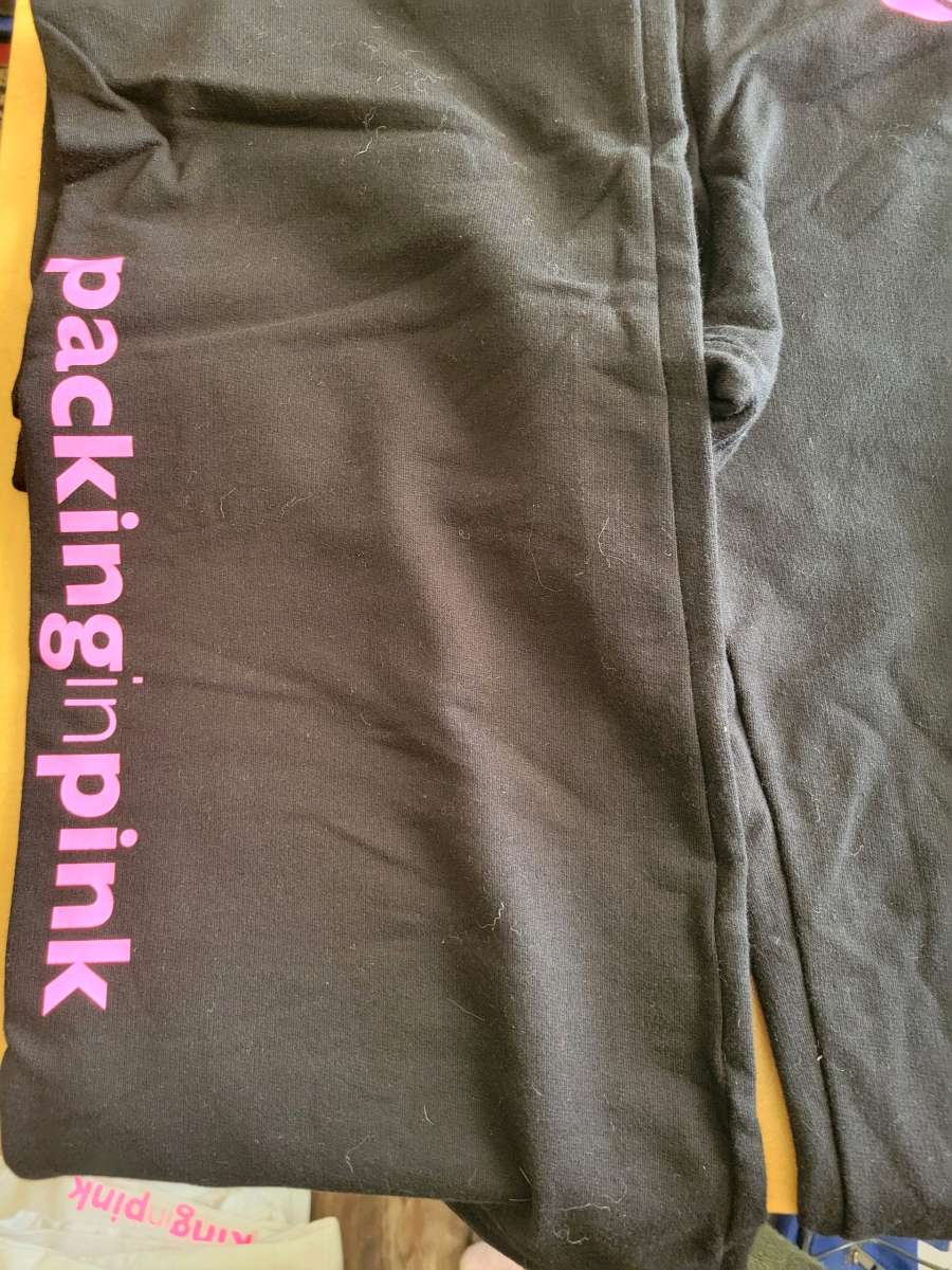 packing in Pink Sweat Pants