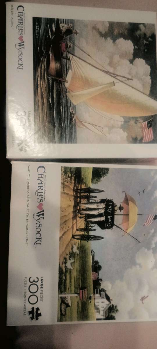 charles wysocki puzzles I have 20 of them all the pieces