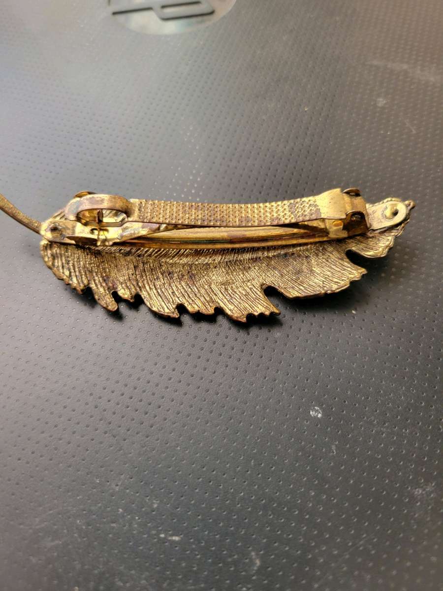 gold metal feather hair clip