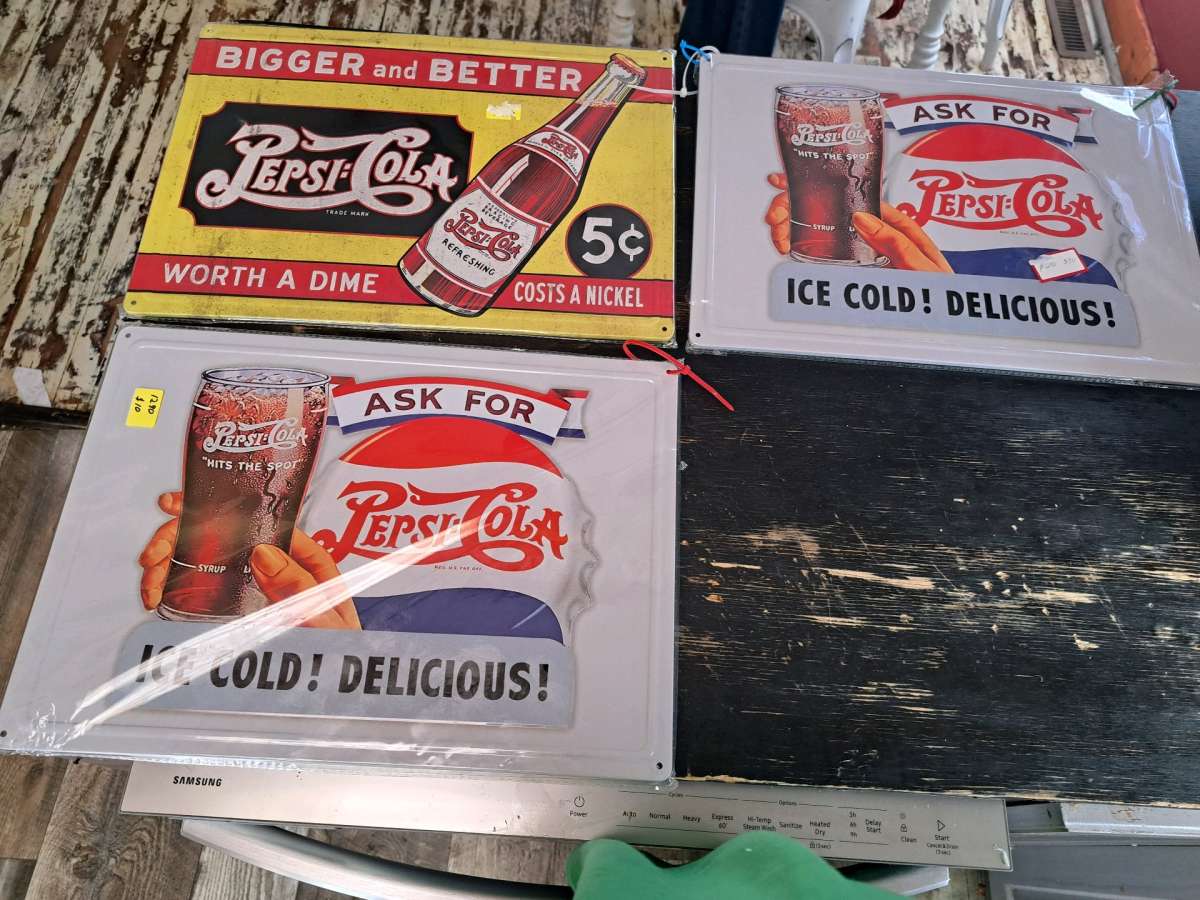 Pepsi tin signs