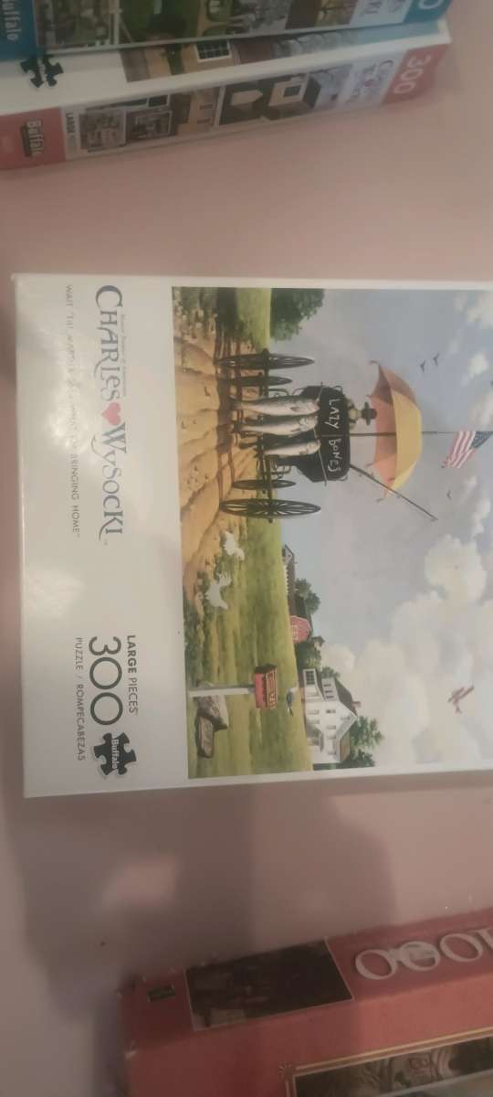 charles wysocki puzzles I have 20 of them all the pieces