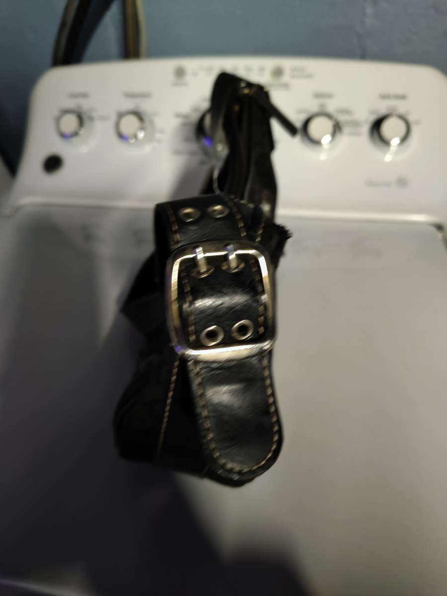 a black small purse Mine West