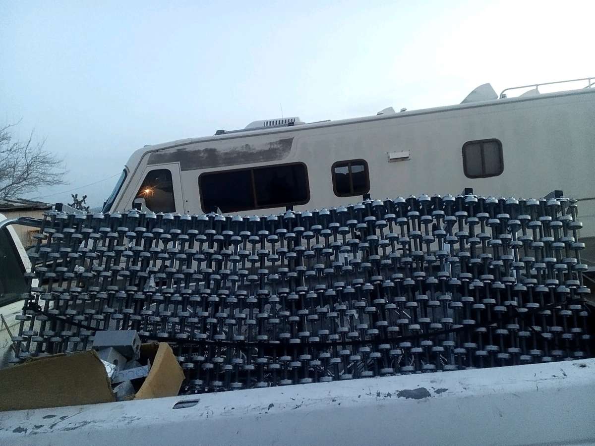 two roller carts to unload cargo from trucks