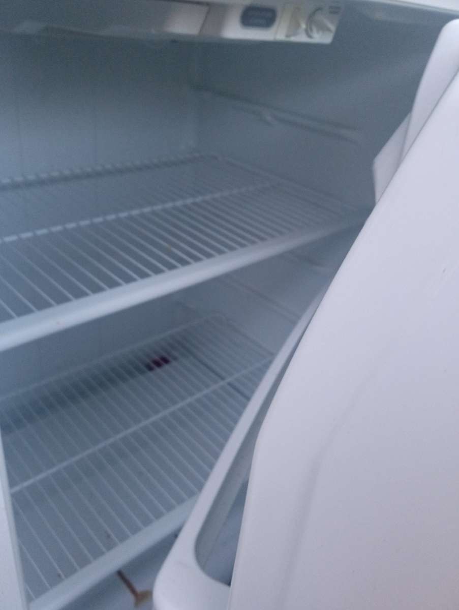 refrigerator and gently used electric stove