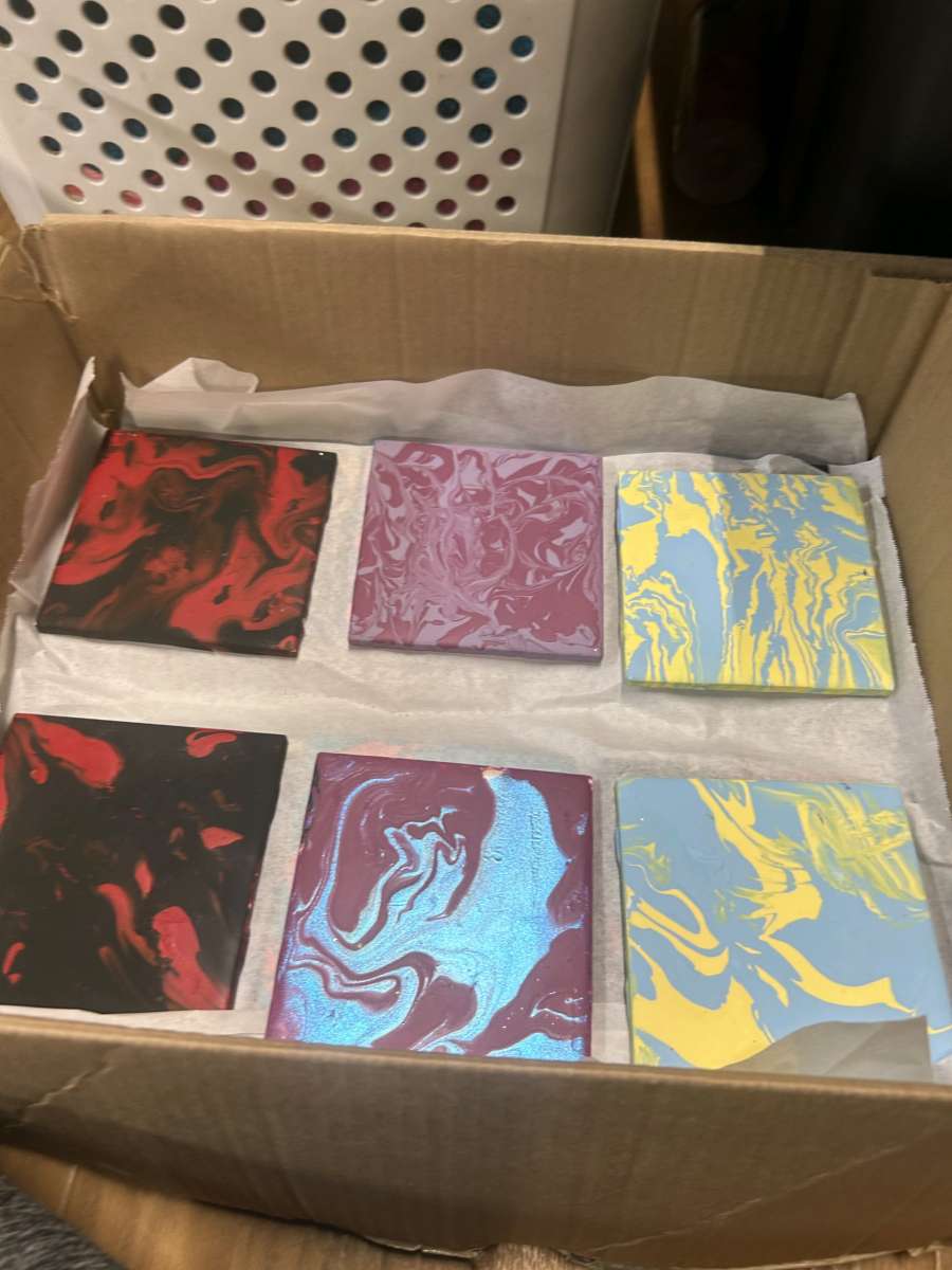 designed ceramic tiles for home decor and used for coasters