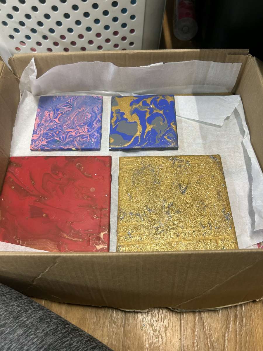 designed ceramic tiles for home decor and used for coasters