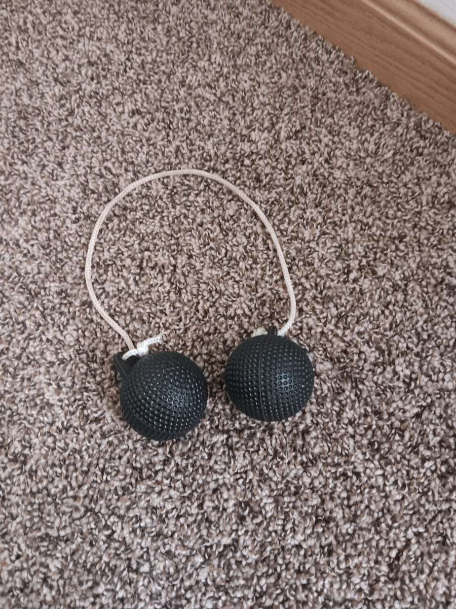 Set 1 black bolo balls for ladder ball toss game