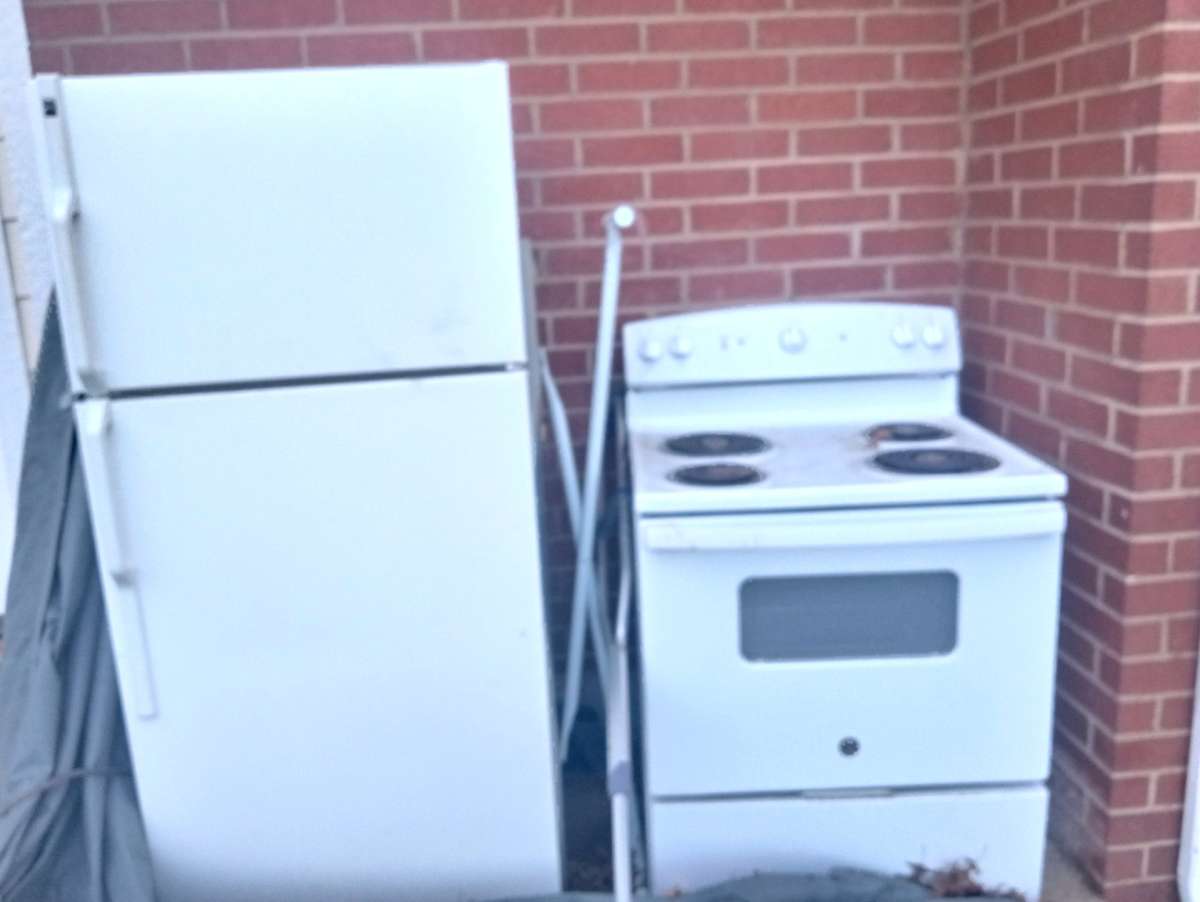 refrigerator and gently used electric stove