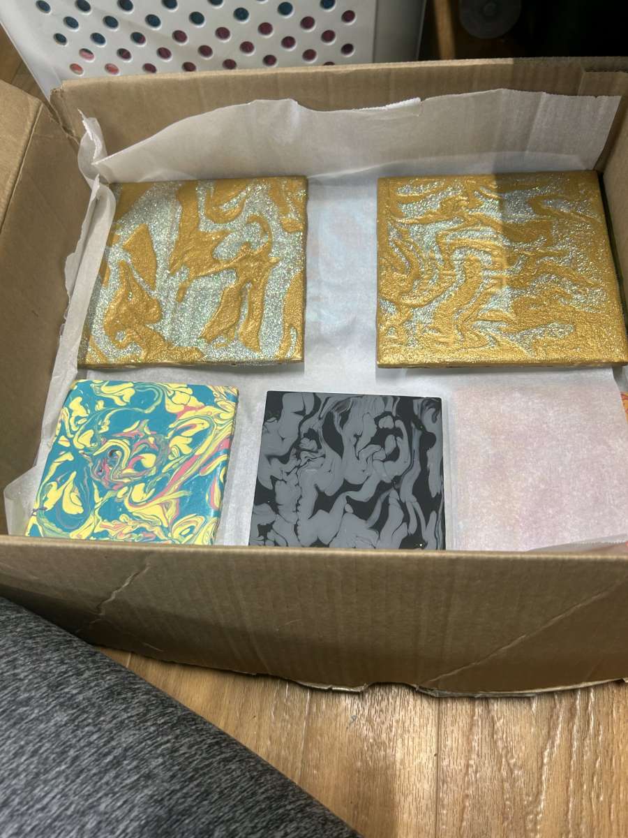 designed ceramic tiles for home decor and used for coasters