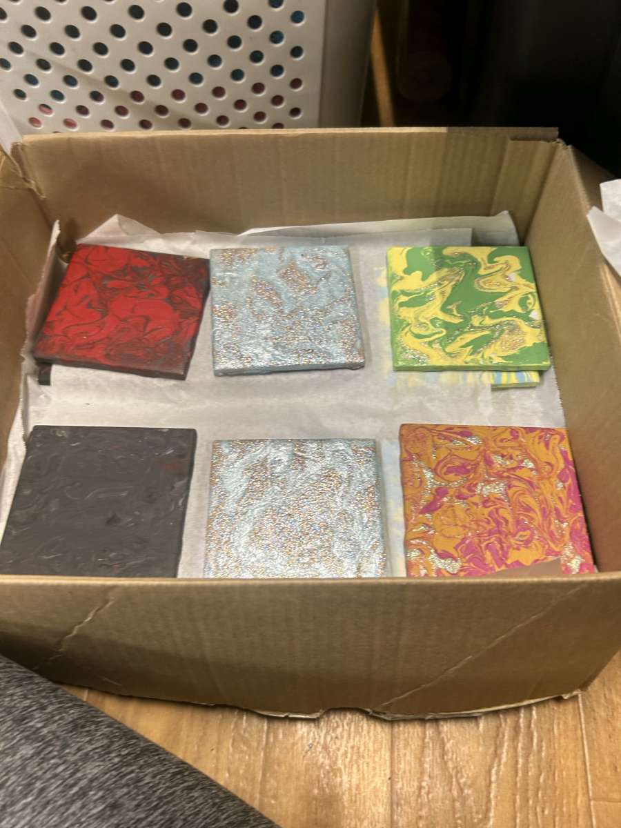 designed ceramic tiles for home decor and used for coasters