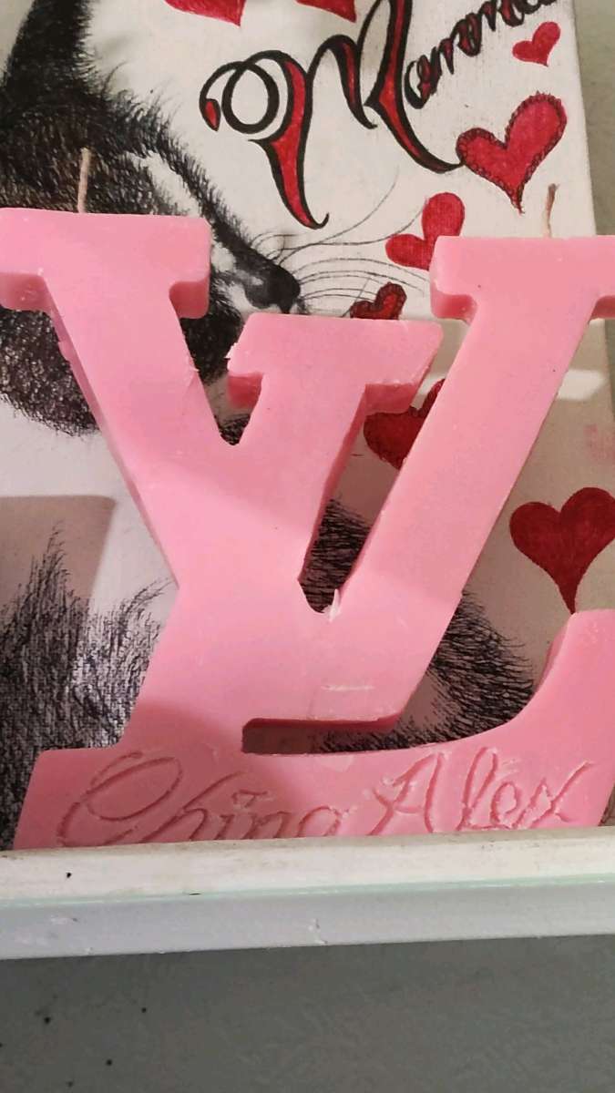 Louis vuitton versace and Chanel candles