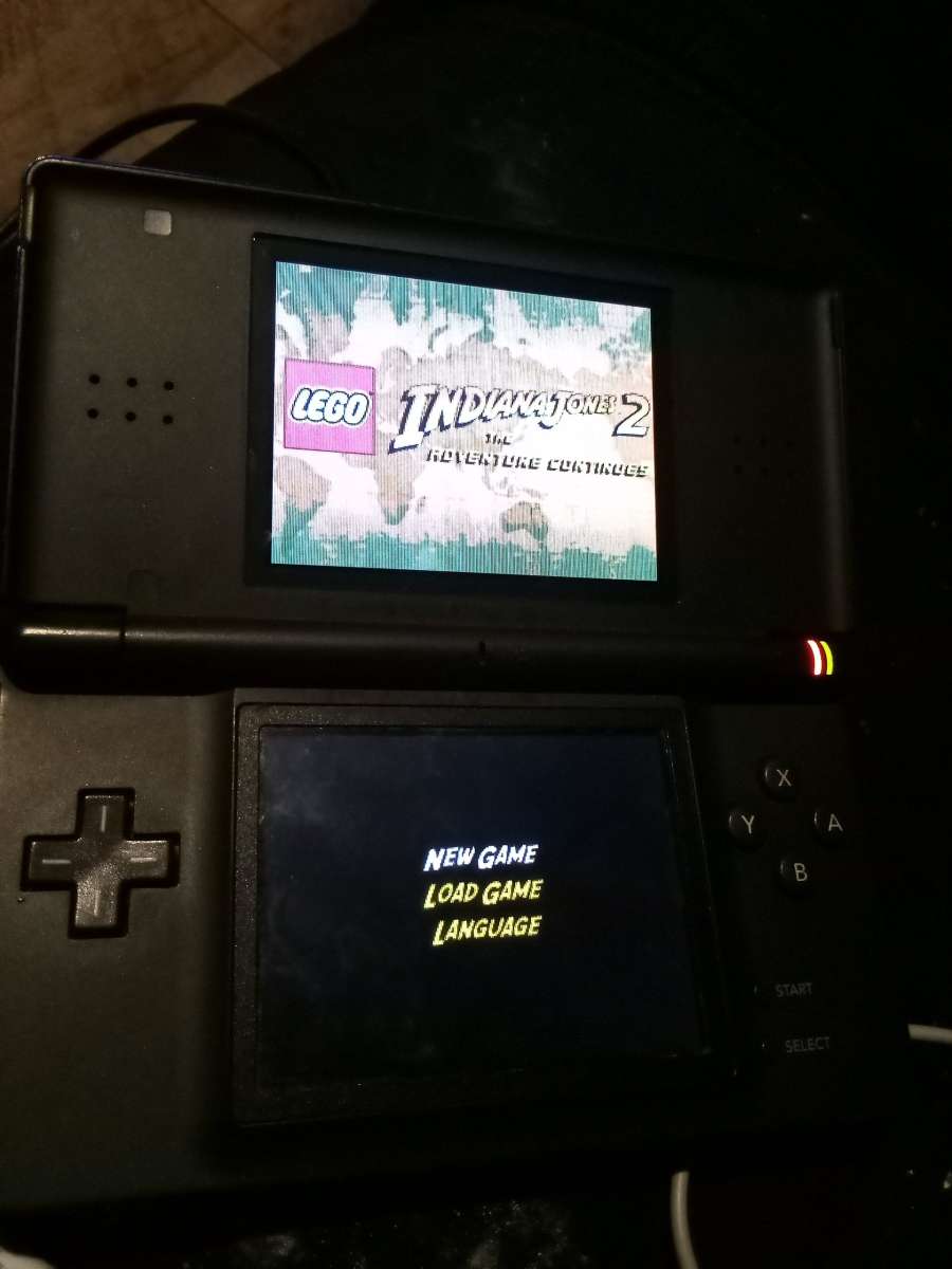 Nintendo DS with game and charger and pen