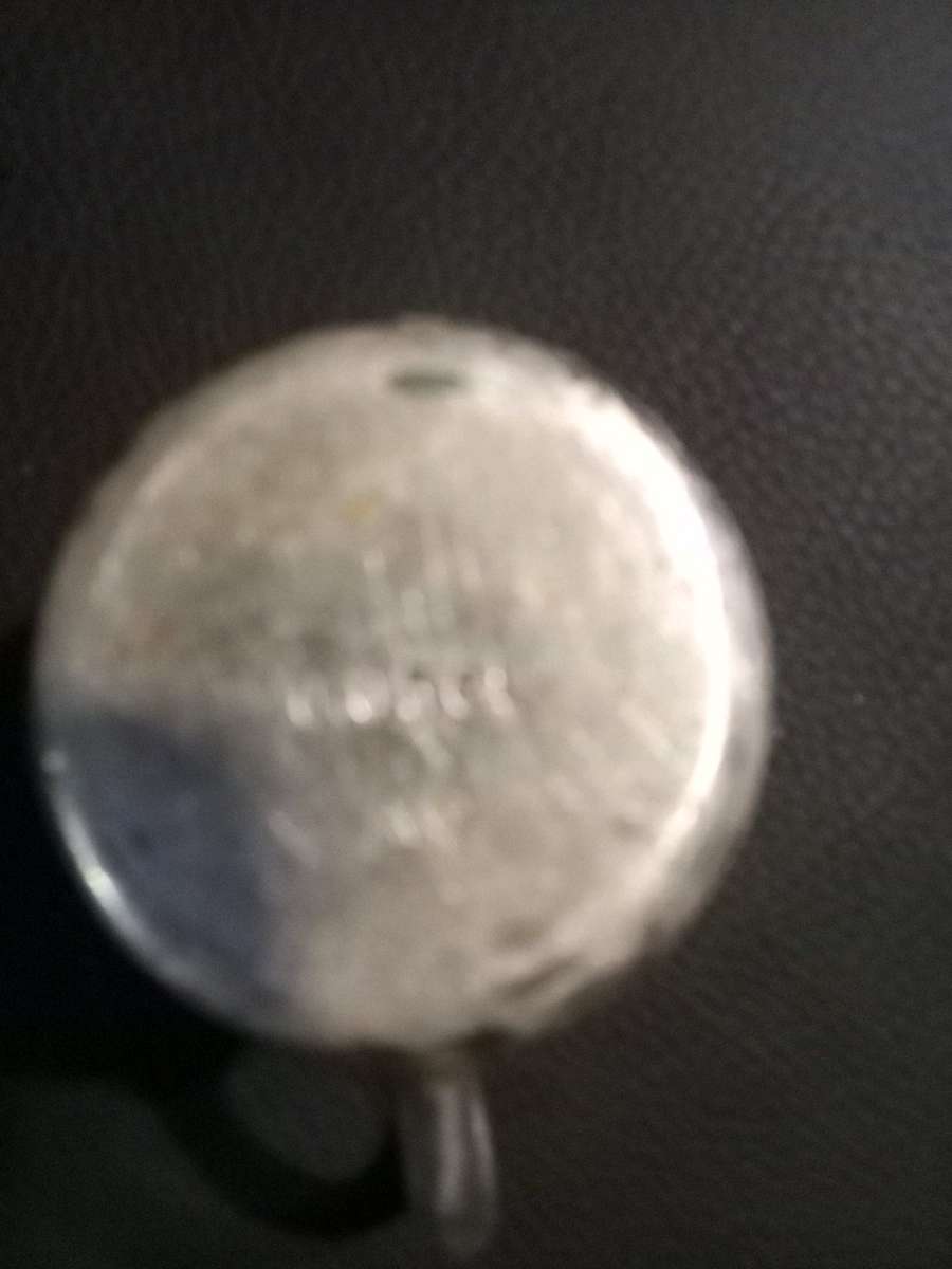 miniature silver water pitcher