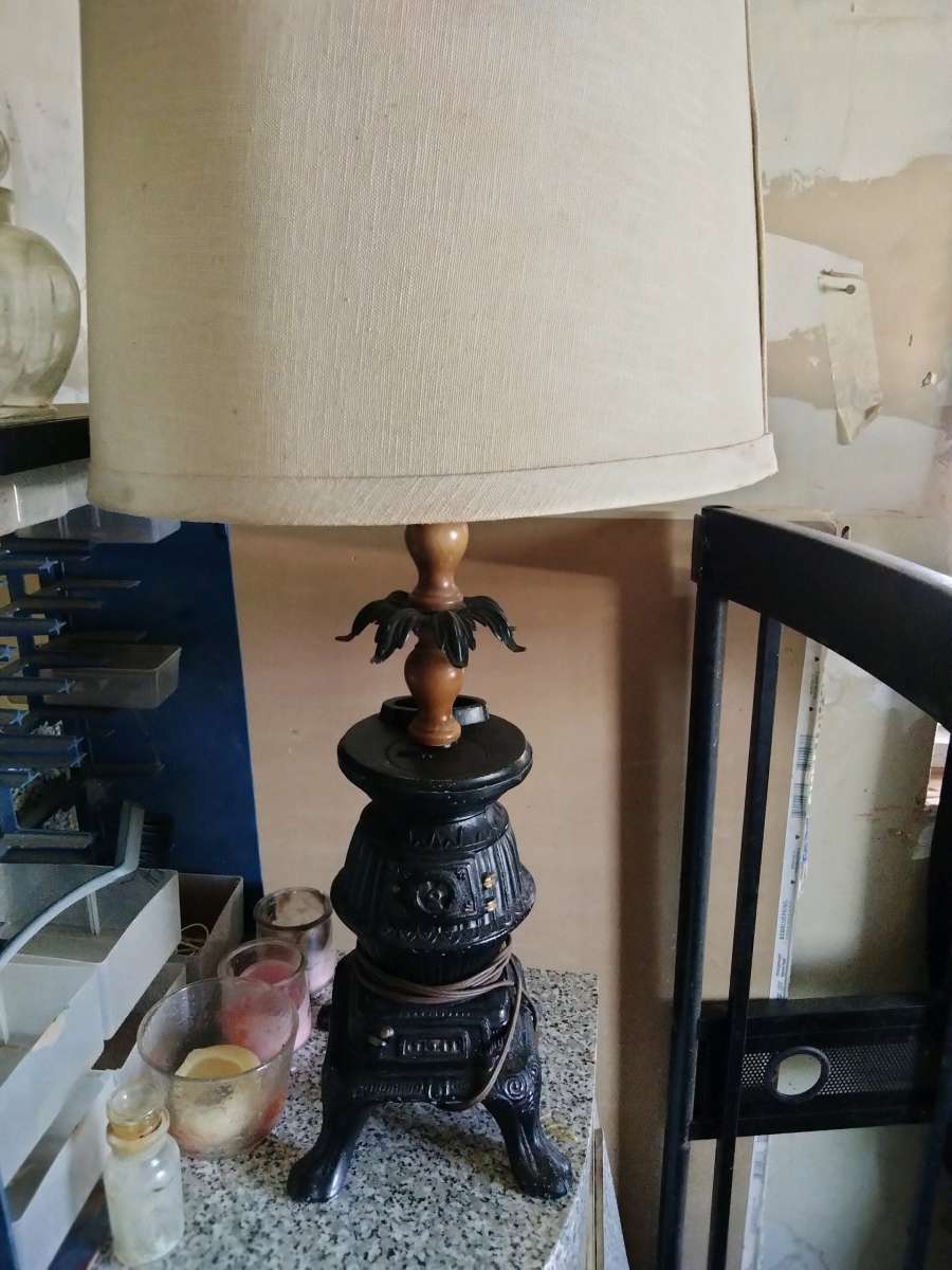 lamp with a pot belly stove base