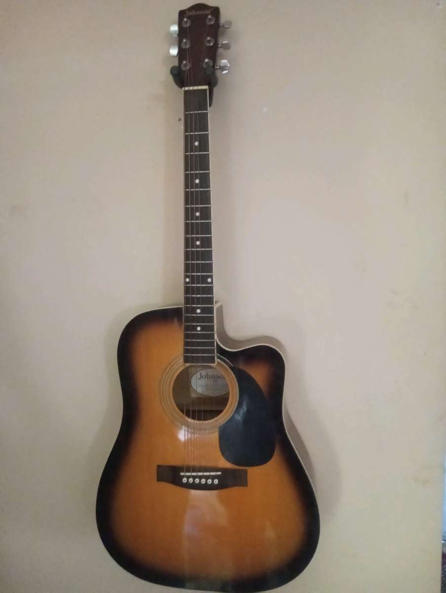 Johnson electric acoustic guitar and line 9 line 6 amp