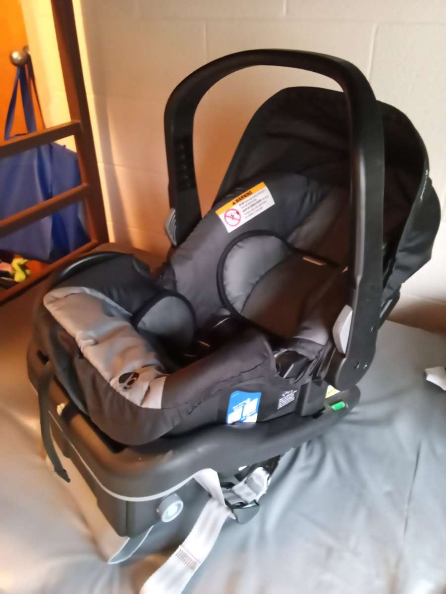 BabyTrend infant car seat with base