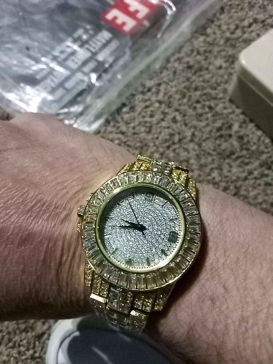 fake diamond and gold watch