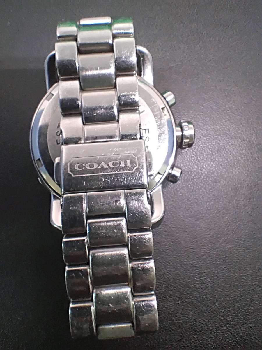 Womens Coach watch with diamonel