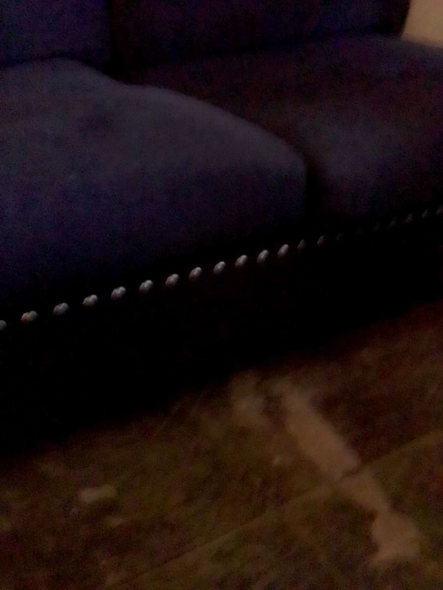 studded black contemporary couch