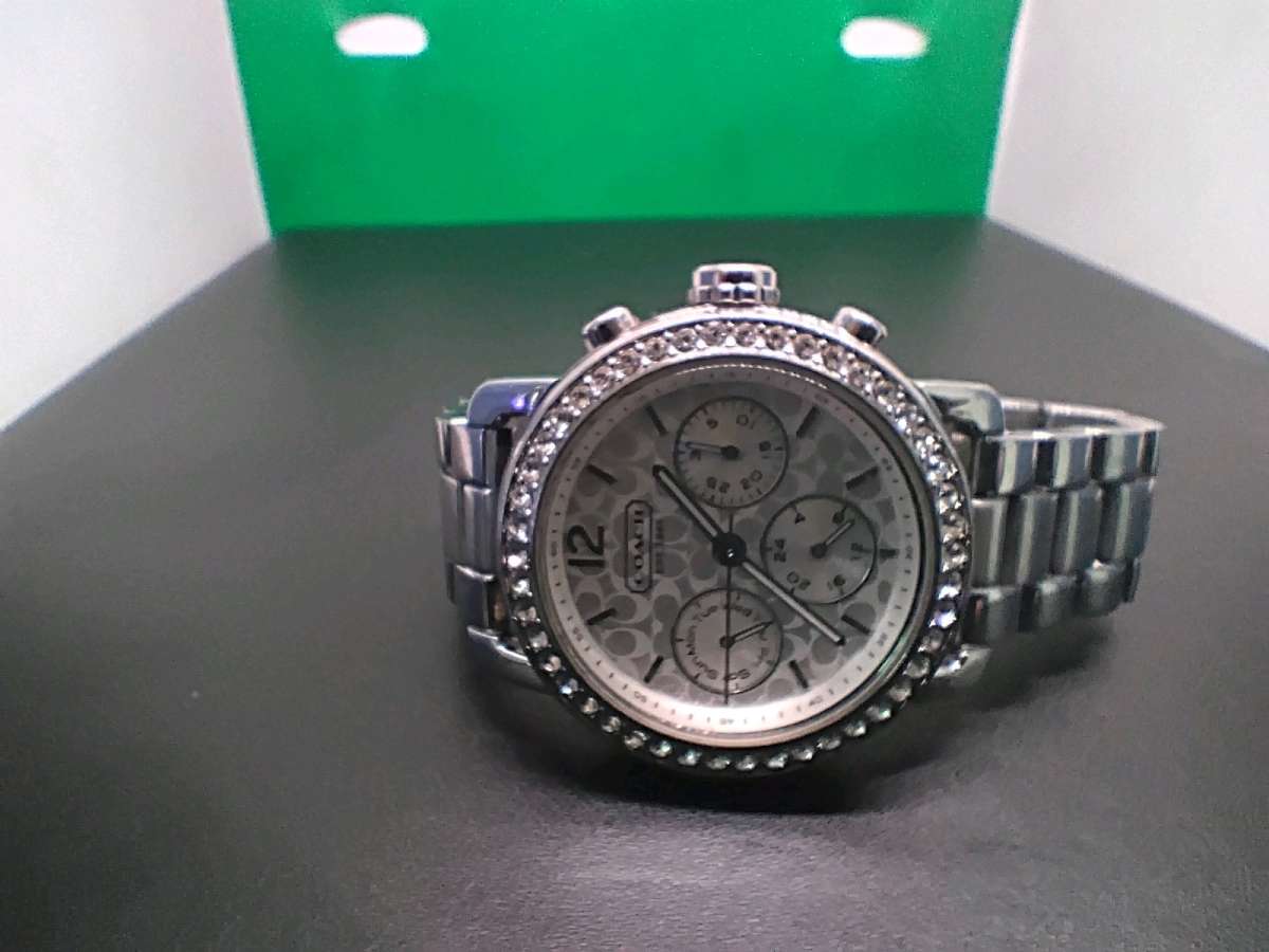 Womens Coach watch with diamonel