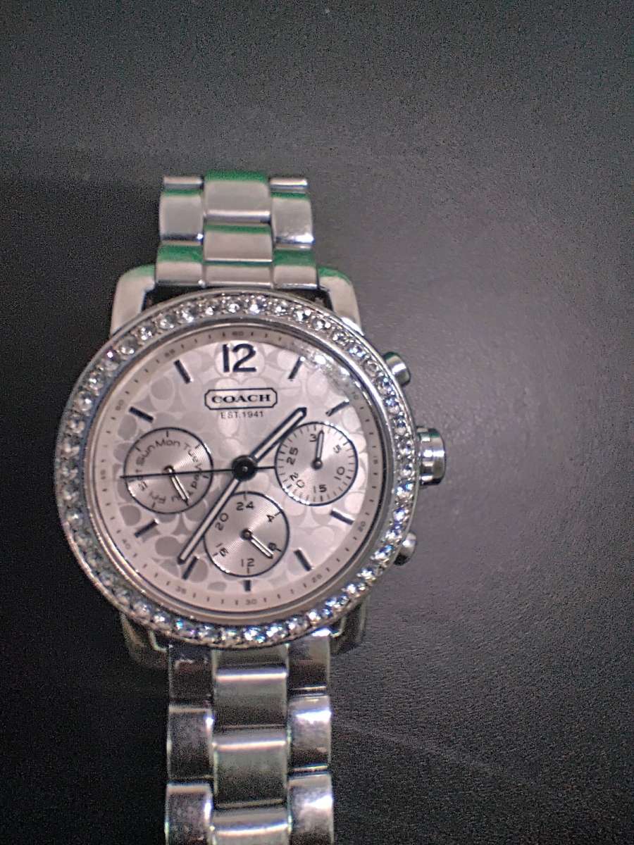 Womens Coach watch with diamonel