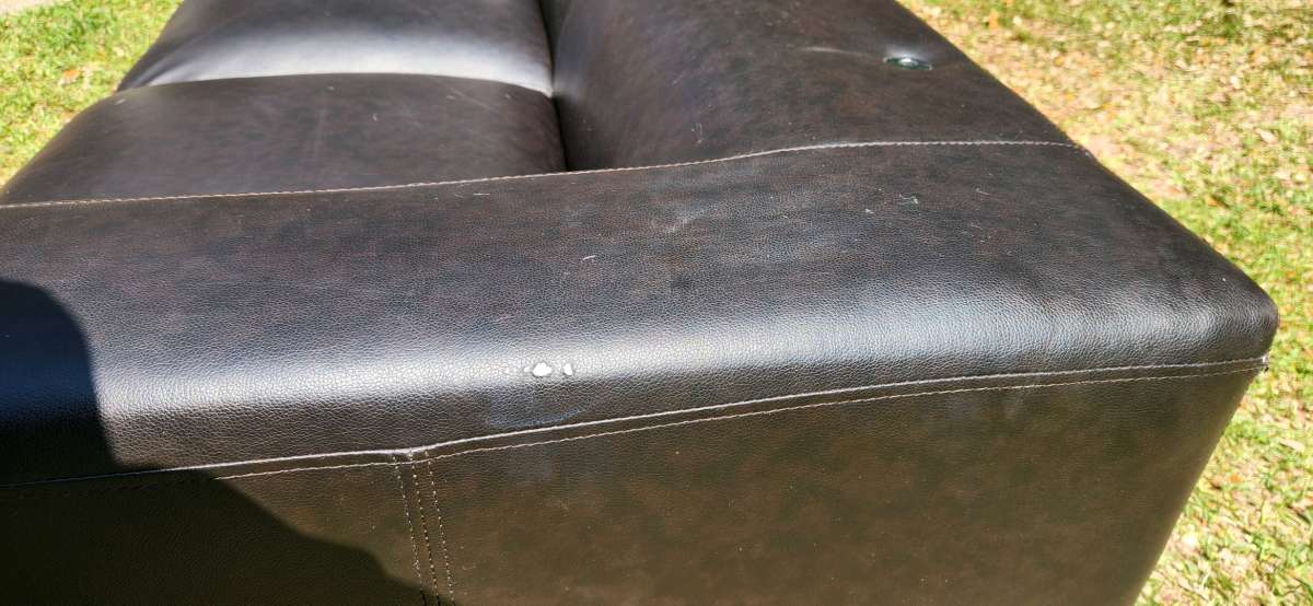 Black modern style leather couch very comfy cushions attache