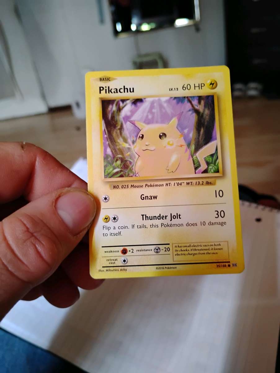 selling rare 2016 Pikachu and rare 2016 team rocket trainer