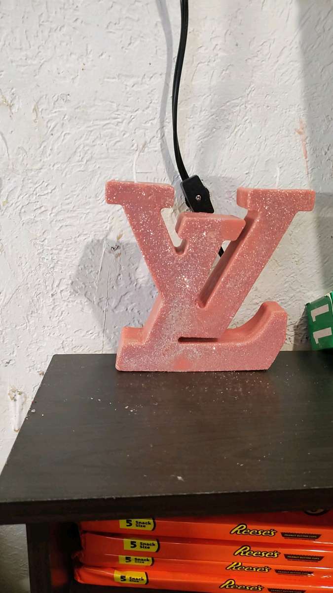 Louis vuitton versace and Chanel candles