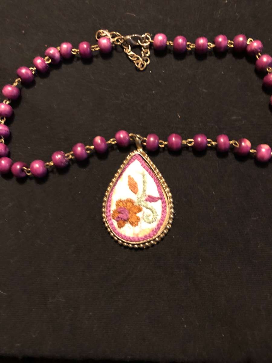 hand stitch necklace on a 20 inch chain vintage