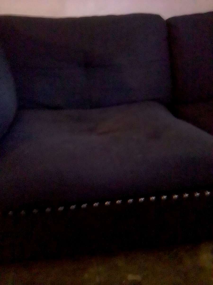 studded black contemporary couch