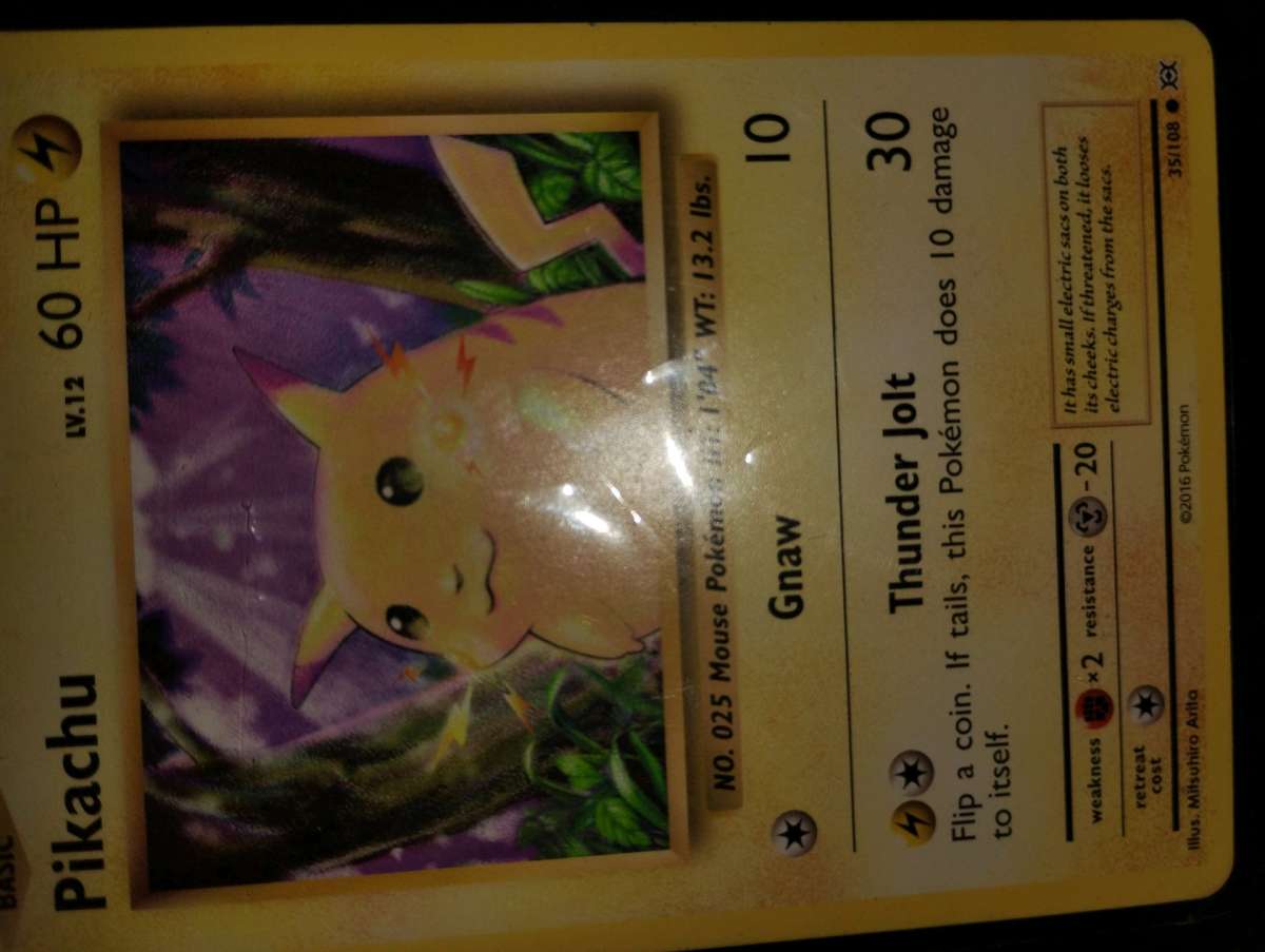 selling rare 2016 Pikachu and rare 2016 team rocket trainer